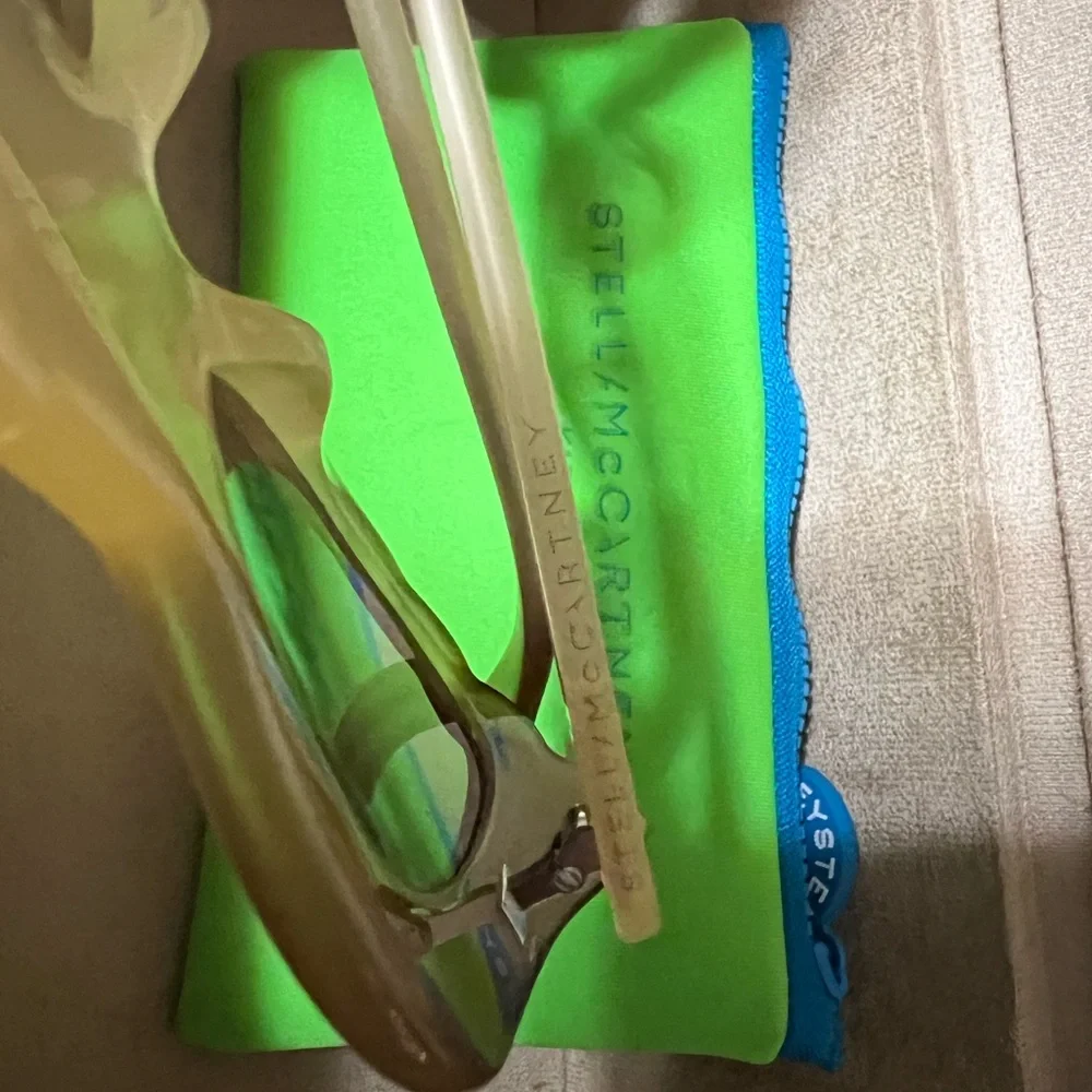 Stella McCartney kids eagle sunglasses with Neon Green Case